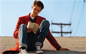 Andrew Garfield, an American-British actor, lost in reading